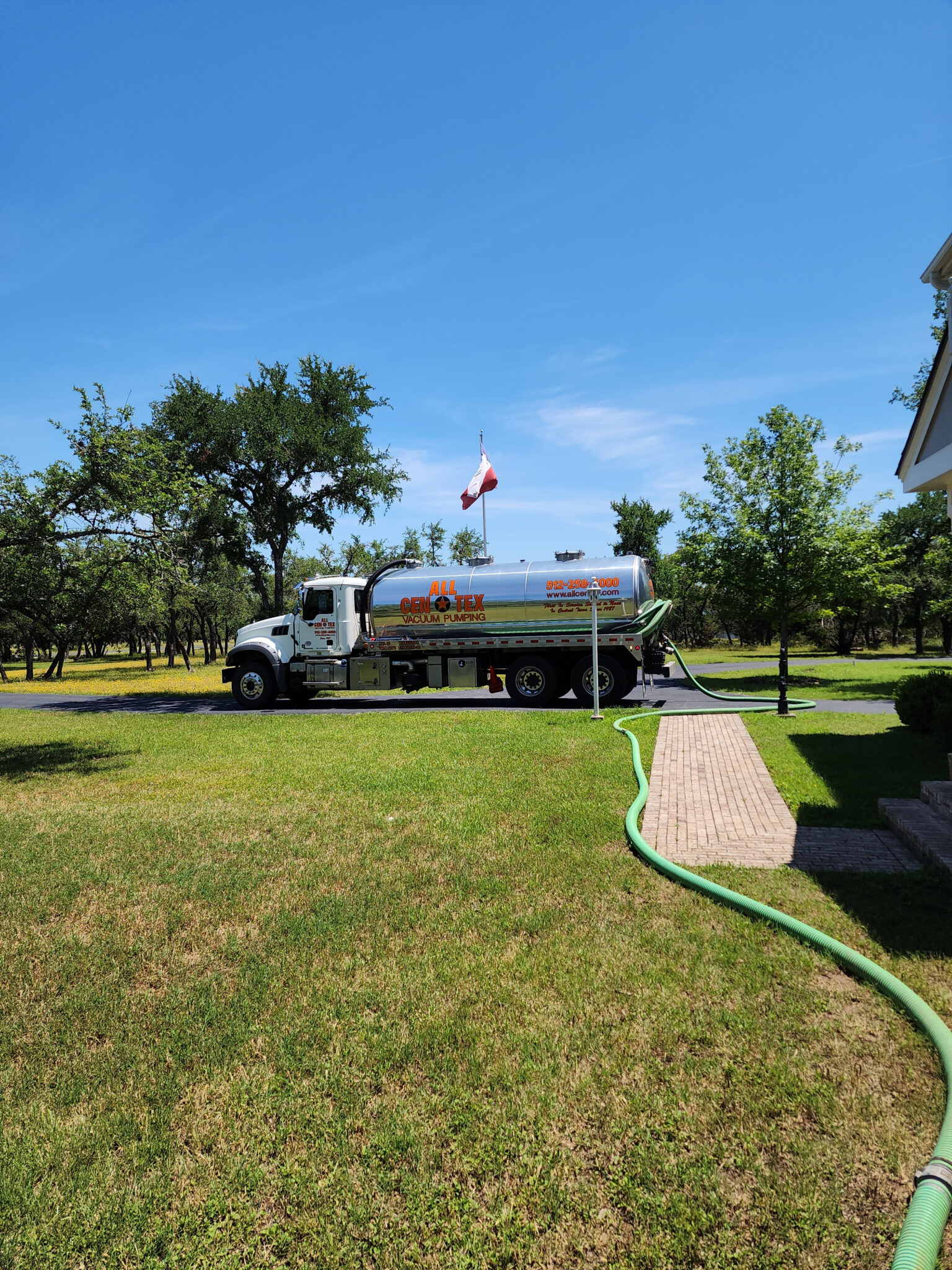 Residential Septic Pumping with Flag